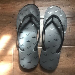 Hollister black flip flops